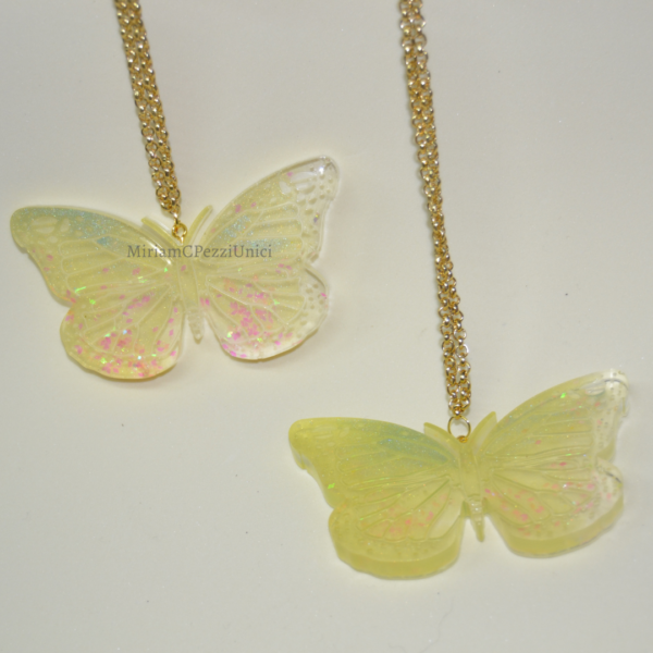 Farfalle da appendere, in resina gialla, azzurro e arancio - immagine 3