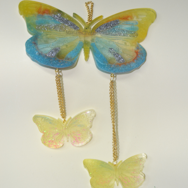 Farfalle da appendere, in resina gialla, azzurro e arancio