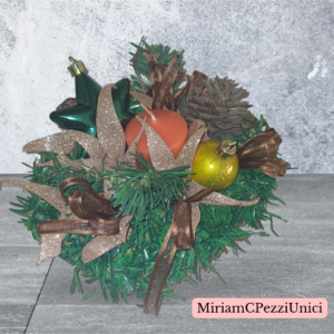 centro tavola terracotta con candela rossa e stella verde